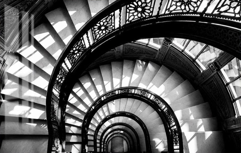 Spiral Staircase Depths Glass Wall Art